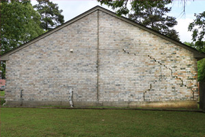 house with cracked foundation and exterior wall