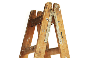 isolated wooden ladder standing up