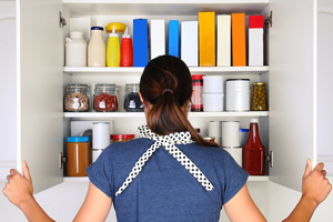 Woman Opening Pantry